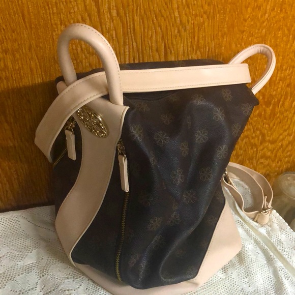 Avon Handbags - Purse/over one shoulder knapsack bag with lots of room in it. Lined. Like new!